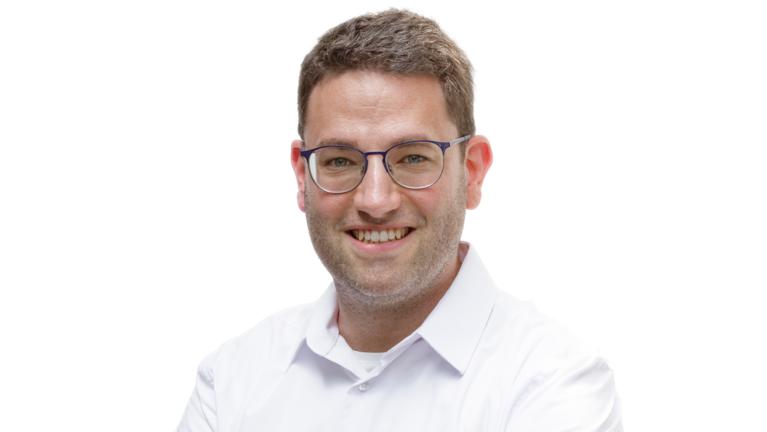 Portrait von Patrick Parschau. Mitarbeiter der Autowelt Schmidt.