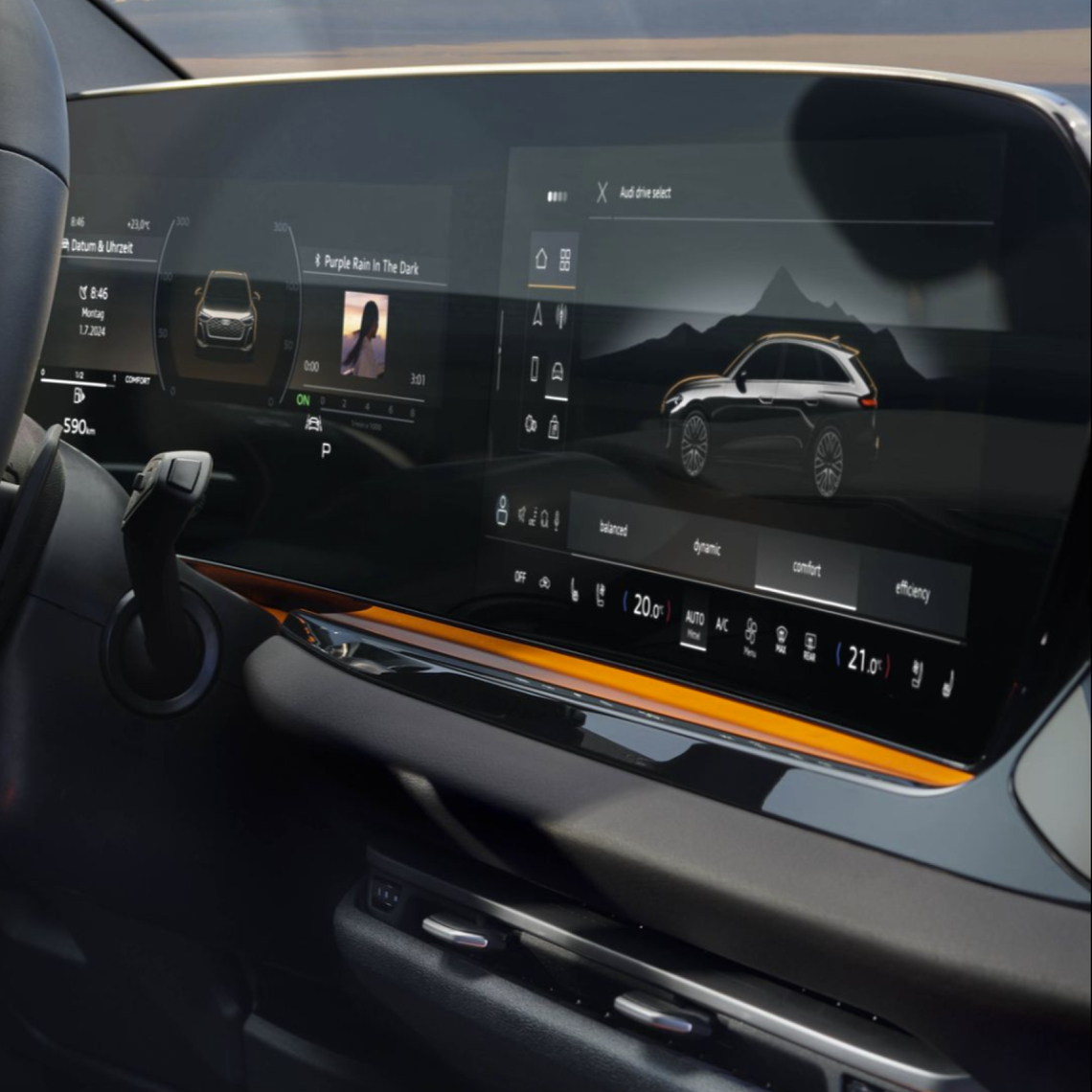 Digitales Cockpit und Infotainment-Display eines Audi A5 mit Fahrmodusanzeige, Klimasteuerung und Mediaplayer in Nahaufnahme
