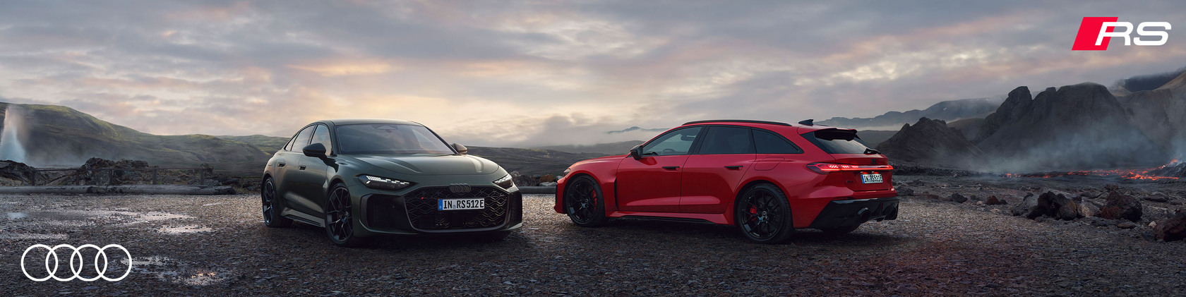 Zwei Audi RS5 Modelle – eine Limousine und ein Avant – in dunkler Vulkanlandschaft mit RS Branding.